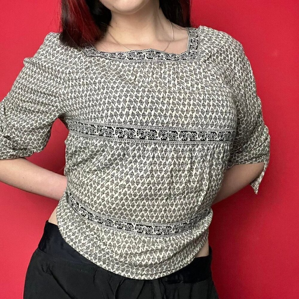 Milkmaid style top with muted floral pattern